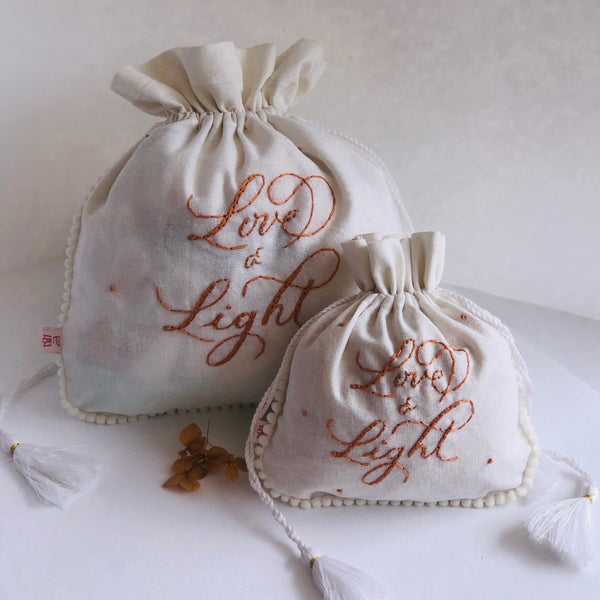 Hand embroidered  calligraphy Pouches